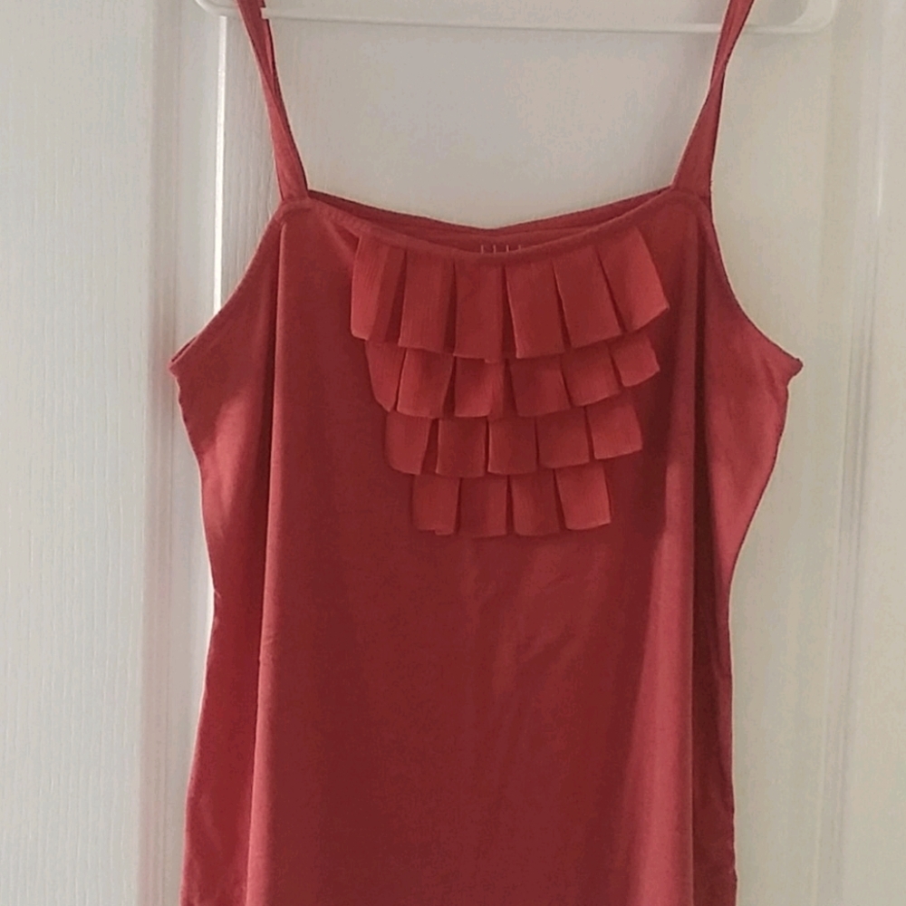 Tank with ruffles.
